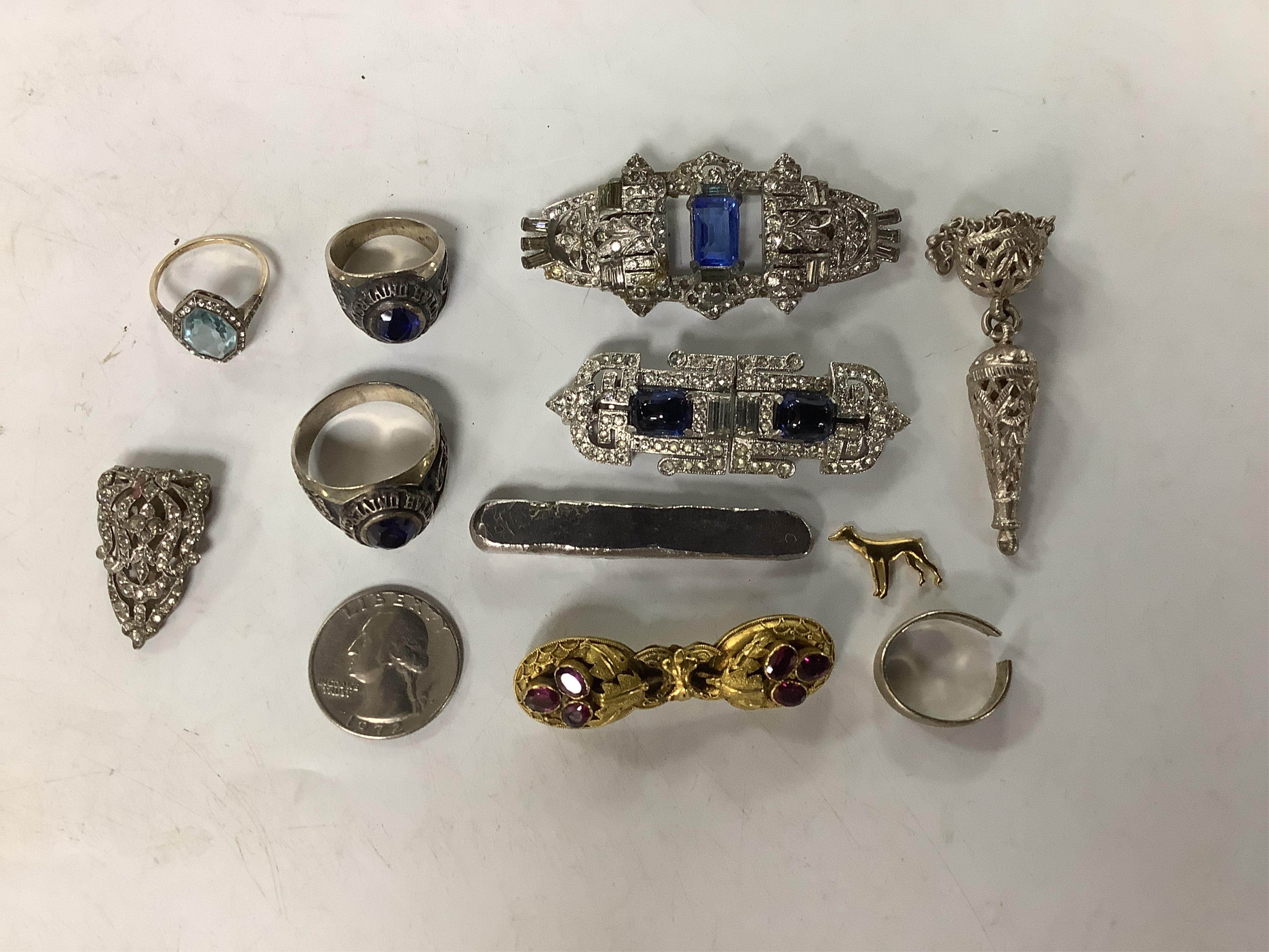 A group of paste and other jewels, including two two colour clip brooches, a Victorian garnet set pinchbeck brooch, 51mm, three paste set rings including 925 and five other items.